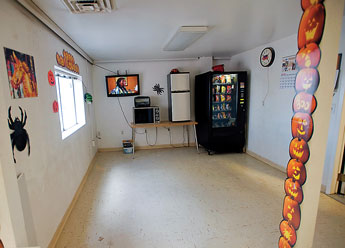A microwave, refrigerator and vending machine sit in an empty room Wednesday at the Gallup-McKinley County Schools bus barn. Employees content they are no longer allowed to eat lunch on the property and chairs were removed from the room in retaliation by management for an alleged "unauthorized meeting," employees claim never occurred. &copy; 2011 Gallup Independent / Adron Gardner 